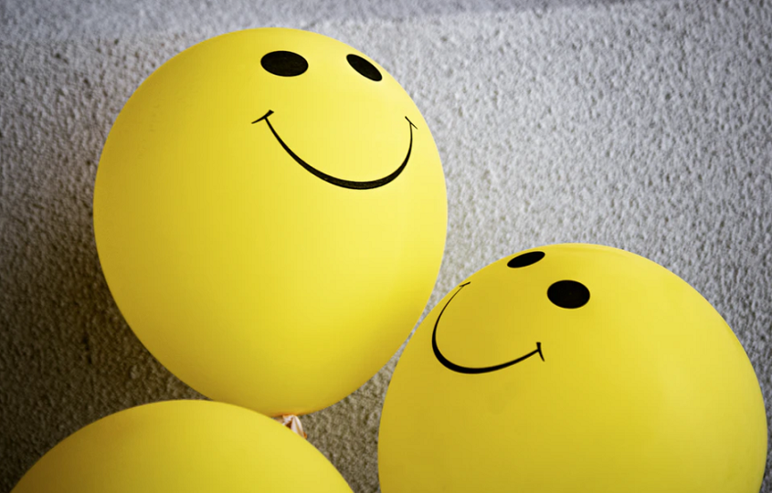 balloons with smiley faces